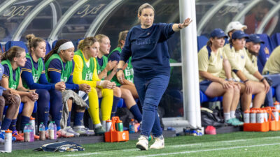 Laura Harvey on the sideline