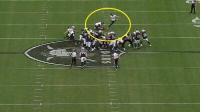 Cam Little kicking a long field goal