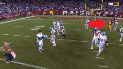 Daron Payne punching Amon-Ra St. Brown