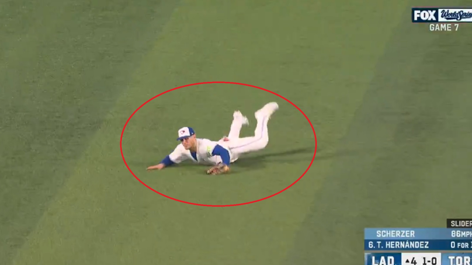 Daulton Varsho lays on the ground after a dive