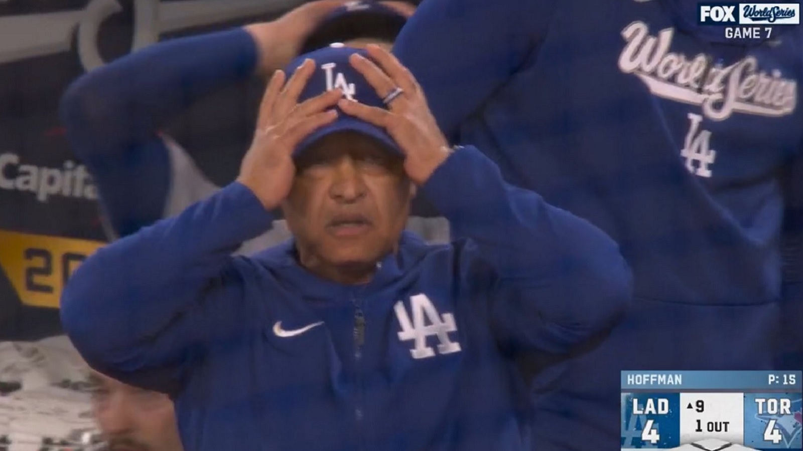 Dave Roberts with his hands on his head