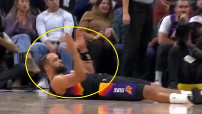 Dillon Brooks gesturing while on the ground