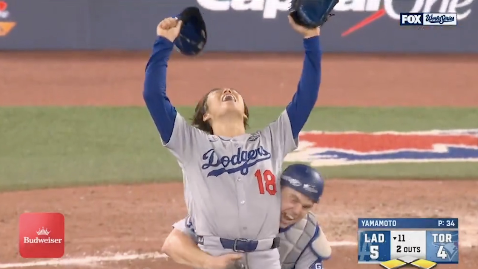 Dodgers' Yoshinobu Yamamoto and Will Smith celebrate after beating Blue Jays in Game 7 of 2025 World Series