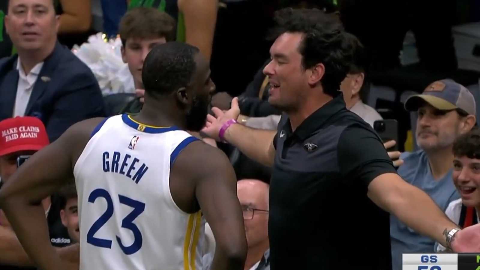 Draymond Green confronting a Pelicans fan