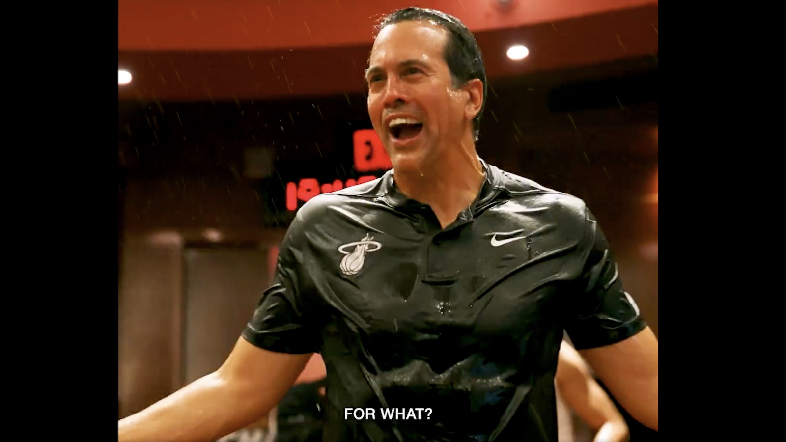 Heat coach Erik Spoelstra getting drenched in the team locker room