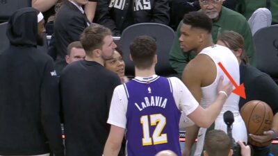Bucks star Giannis Antetokounmpo talking with Lakers players