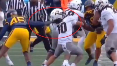 Julian Lewis getting tackled by his hair