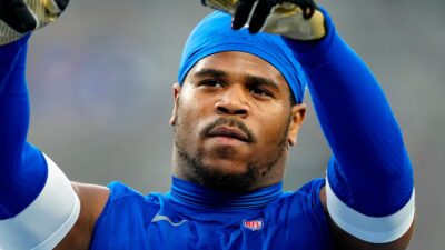 Abdul Carter looks on