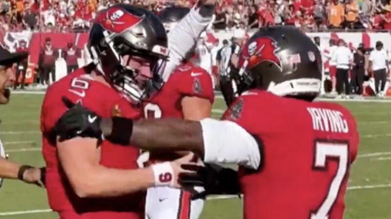 Baker Mayfield and Bucky Irving celebrate a touchdown