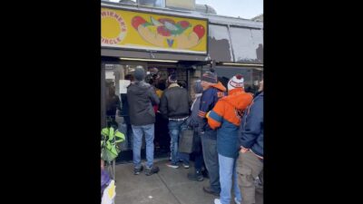 Bears fans lining up for free hot dots at The Wieners Circle