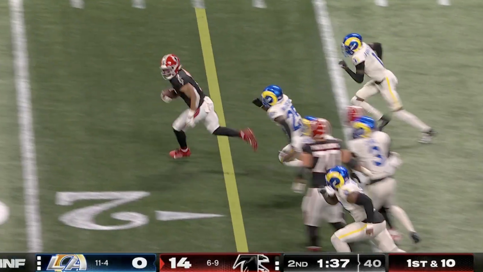 Falcons running back Bijan Robsinson outrunning the Rams' secondary