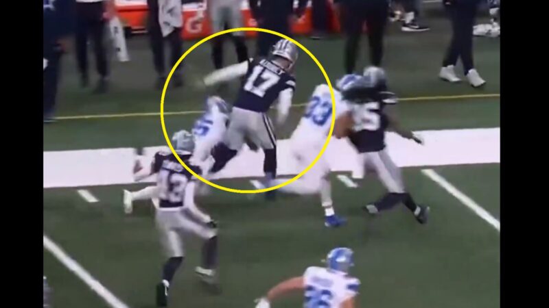 Brandon Aubrey hitting a Lions player