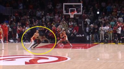 Coby White falling to the ground