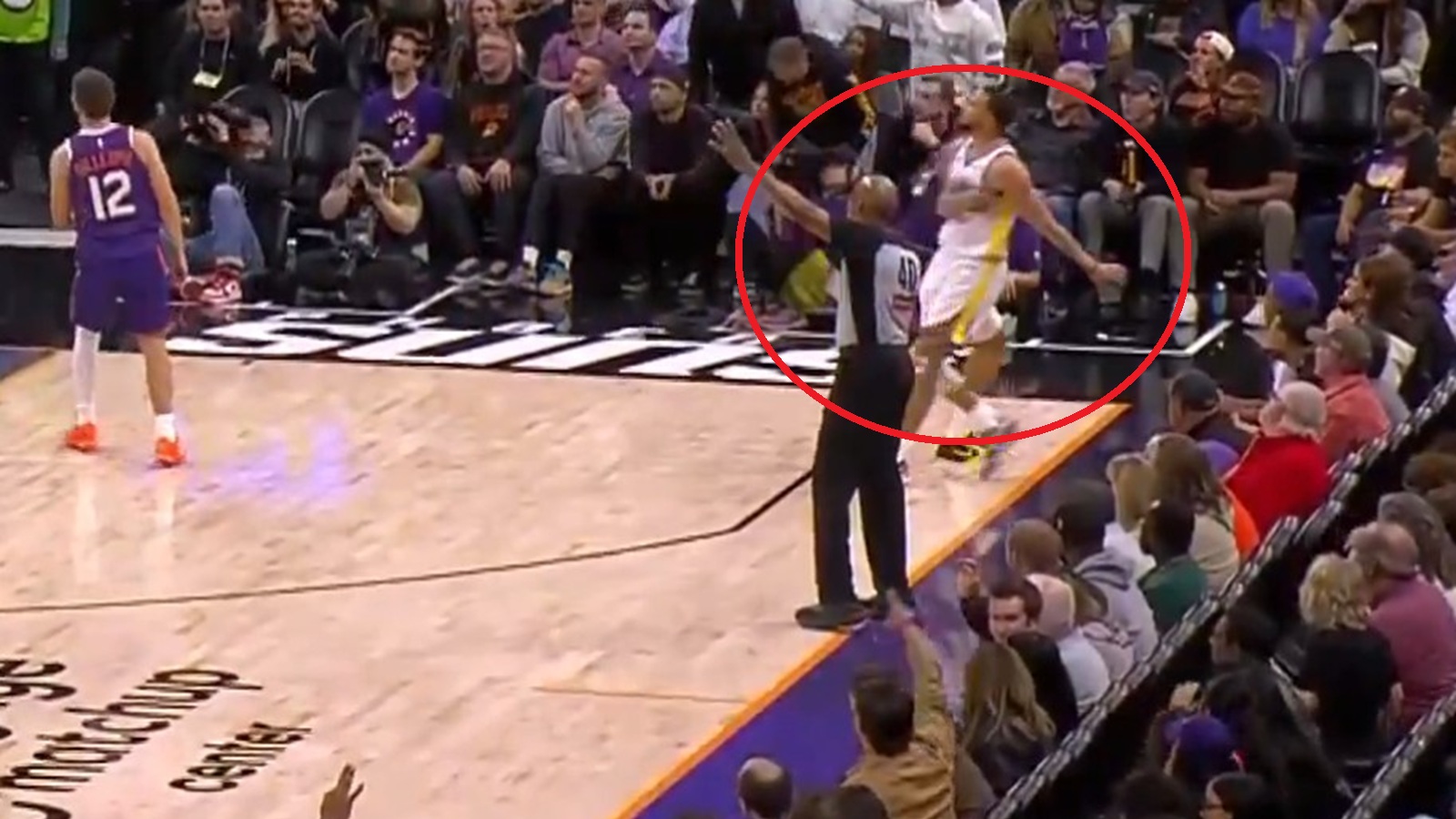 Dillon Brooks fouling Steph Curry