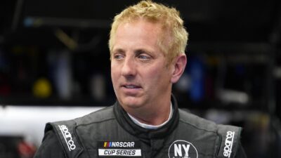 NASCAR driver Greg Biffle looking on