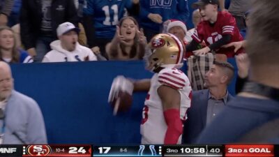 49ers wide receiver Jauan Jennings fakes out a Colts fan