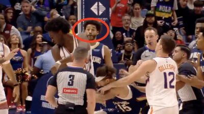 Jordan Poole reacting to Jose Alvarado's punch on Mark Williams during Pelicans-Suns game
