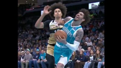 LaMelo Ball getting fouled by Kyshawn George