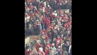 Oklahoma fans leaving Memorial Stadium during CFP game against Alabama