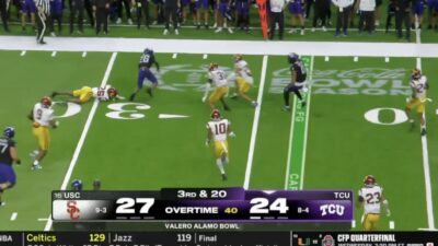 TCU running back Jeremy Payne rushing against USC's defense