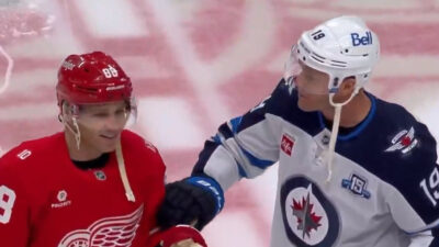 Patrick Kane, and Jonathan Toews greet each other