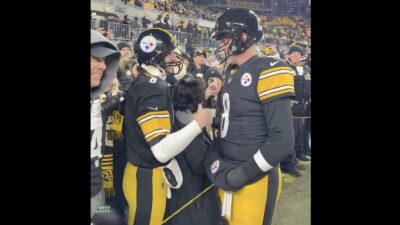 Aaron Rodgers with Steelers fan dressed up as him