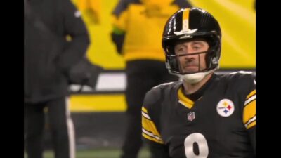 Aaron Rodgers with a blank look on his face