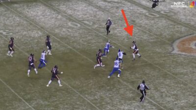 Bears QB Caleb Williams making a throw against the Rams on fourth down