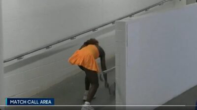 Coco Gauff smashes her racquet