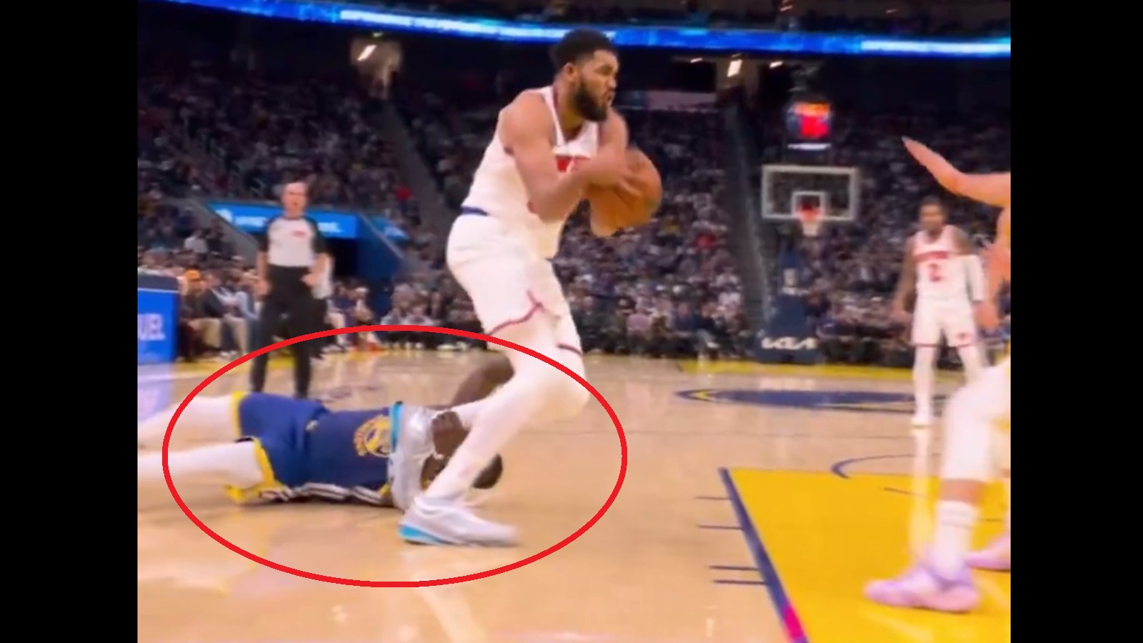 Draymond Green tripping Karl-Anthony Towns