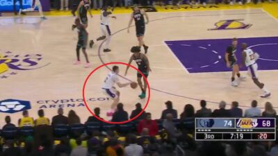 Jake LaRavia dribbling the ball