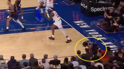 Kawhi Leonard stumbling on a fan