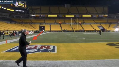 Priest blessing the field before Ravens-Steelers game
