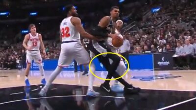 Victor Wembanyama twisting his left knee