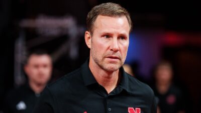 Fred Hoiberg walking on the court