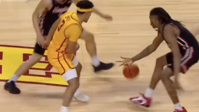 Houston's Joseph Tugler deflecting a pass from Iowa State's Tamin Lipsey