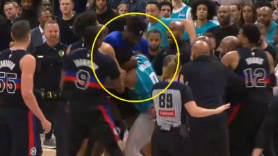 Isaiah Stewart putting Miles Bridges in a headlock