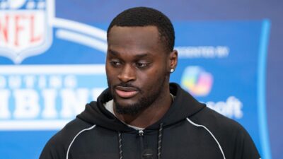 Jeremiyah Love speaking with reporters