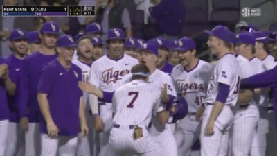 LSU slugger Jake Brown doing a motorboat home run celebration on teammate John Pearson