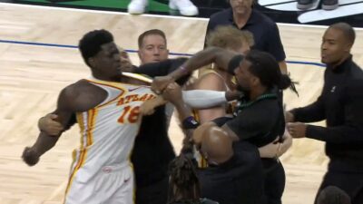 Timberwolves' Naz Reid and Hawks' Mouhamed Gueye fighting