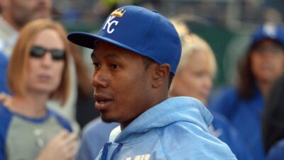 Terrance Gore wearing a Royals hat