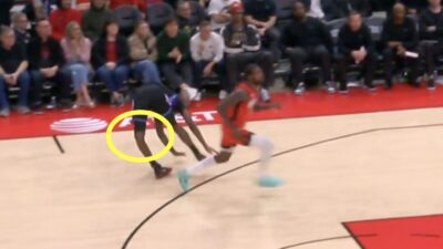 Jazz guard Vince Williams Jr. suffering a knee injury after taking a shot from Rockets wing Tari Eason