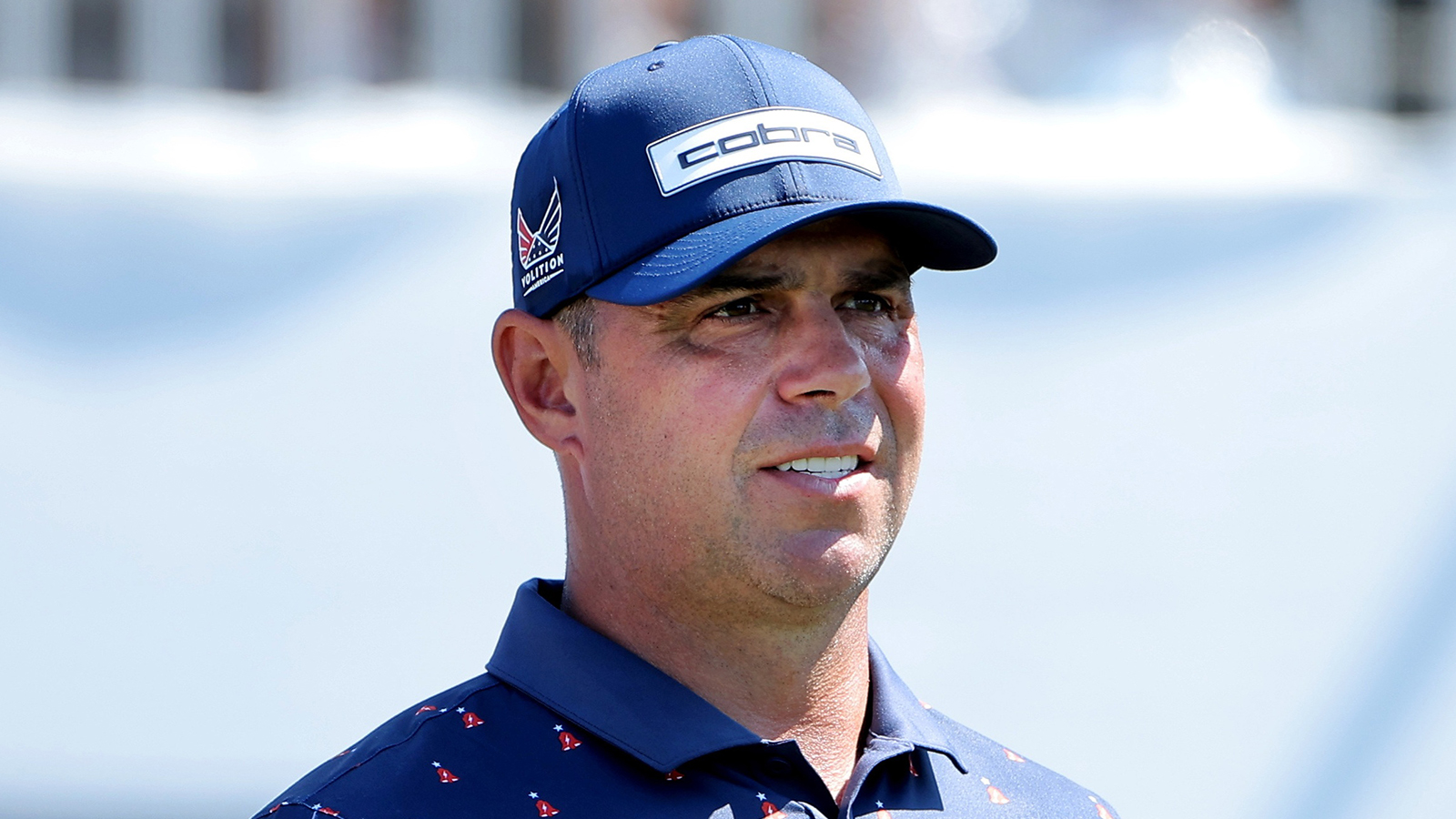 Gary Woodland wearing a cap