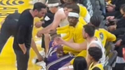 JJ Redick talking to Luka Doncic