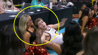 Mario Saint-Supery colliding with a cheerleader