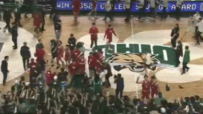 Ohio fans throw trash at Miami (OH) players as they celebrated.