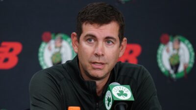 Brad Stevens speaking with reporters
