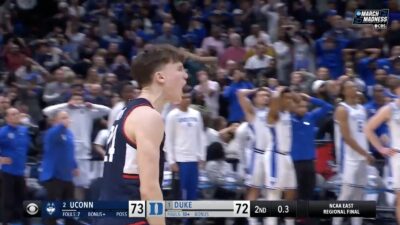UConn's Braylon Mullins celebrating after hitting a game-winning shot against Duke