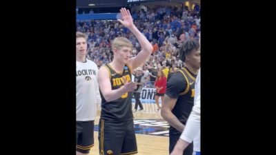 Iowa freshman Cooper Koch doing the "Gator chomp" after beating Florida.