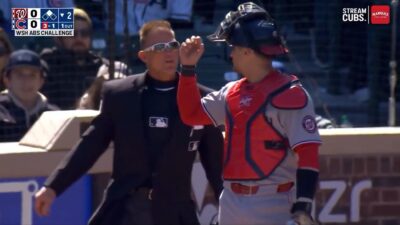 Umpire Jim Wolf complaining
